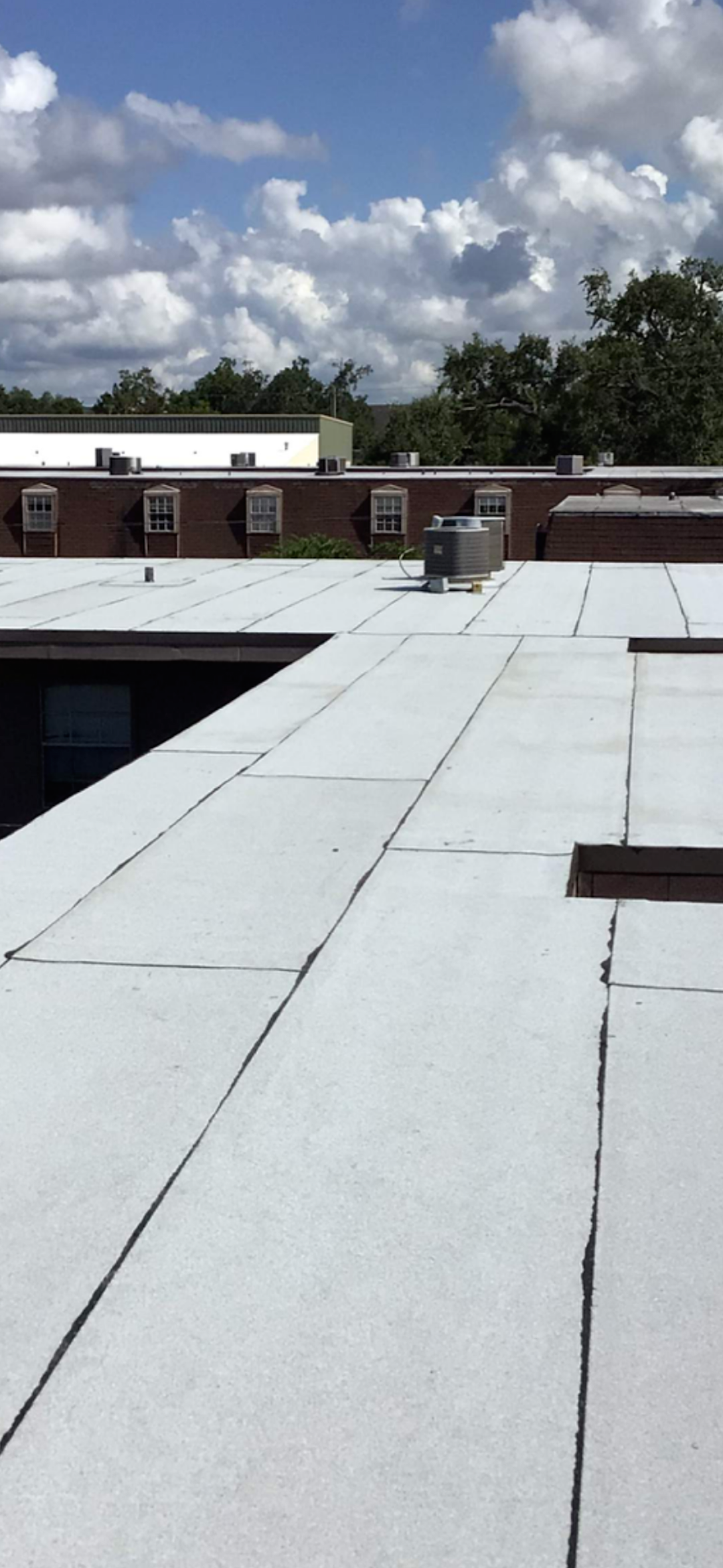 All around Roofing installing mod bit Roof and Clute, Texas